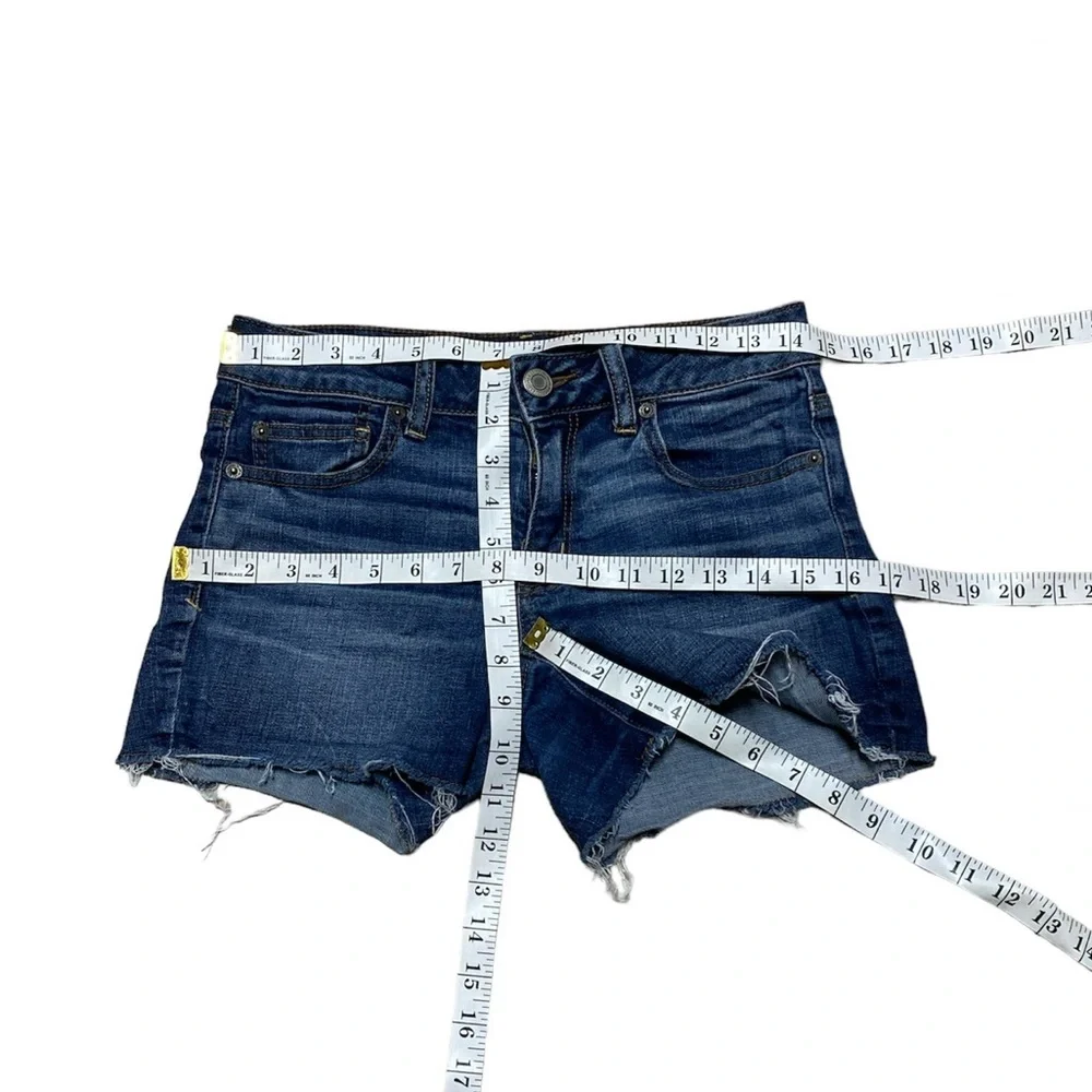 American Eagle Shortie Jean Shorts Women’s 4 Blue Denim Raw Hem Casual Low Rise